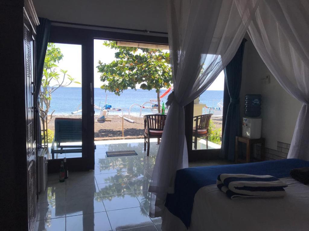 Tambun Sari Beach Homestay Амед Екстер'єр фото