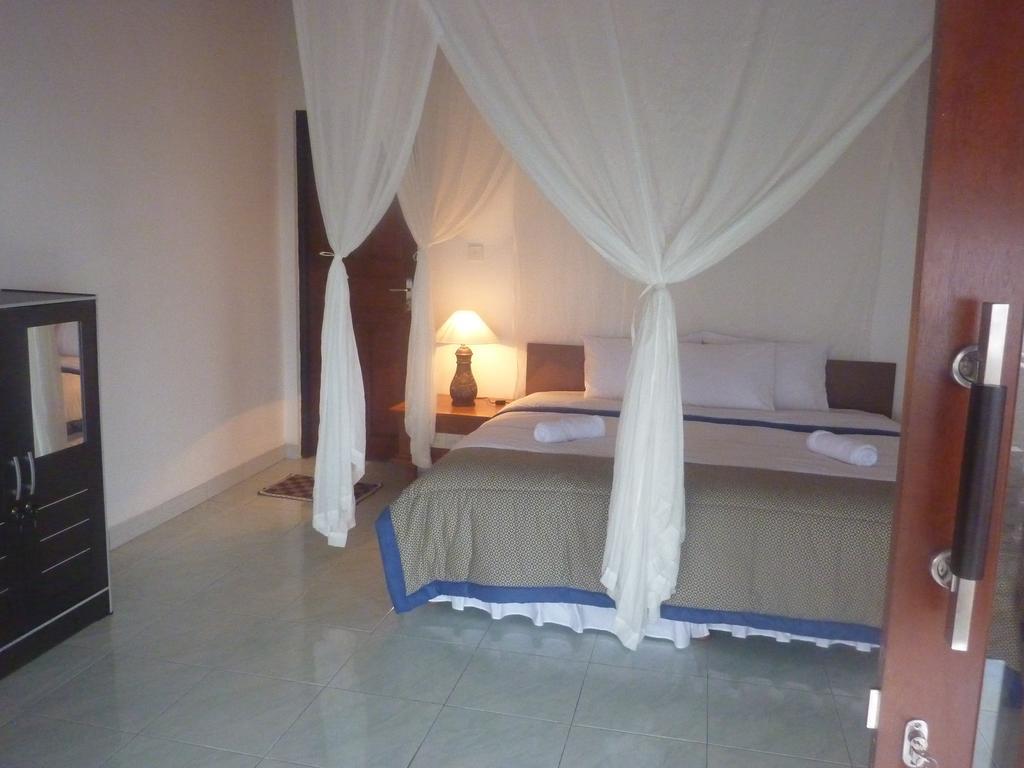 Tambun Sari Beach Homestay Амед Номер фото